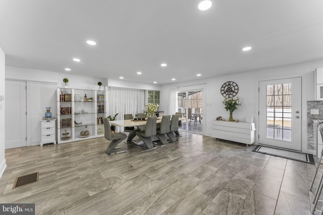 dining area featuring a wealth of natural light, visible vents, and recessed lighting