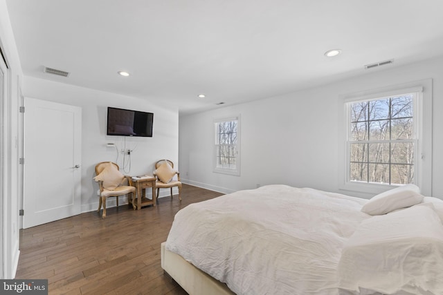 bedroom featuring recessed lighting, visible vents, and dark wood-style flooring