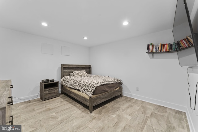 bedroom with recessed lighting and baseboards