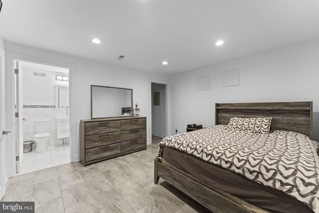 bedroom with recessed lighting, visible vents, and connected bathroom