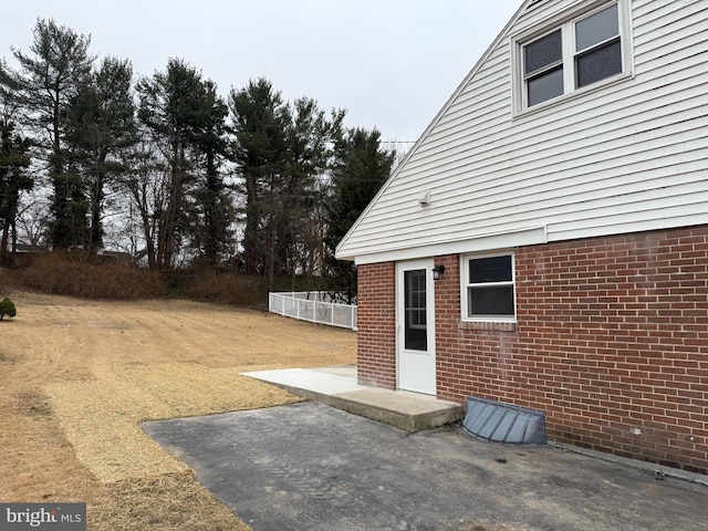 view of yard with a patio and fence