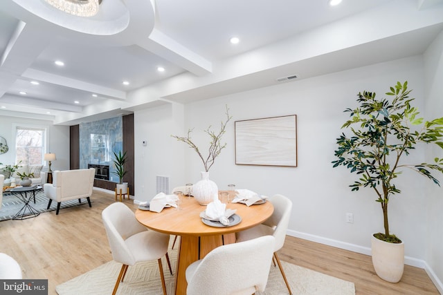 dining space featuring recessed lighting, visible vents, and light wood finished floors