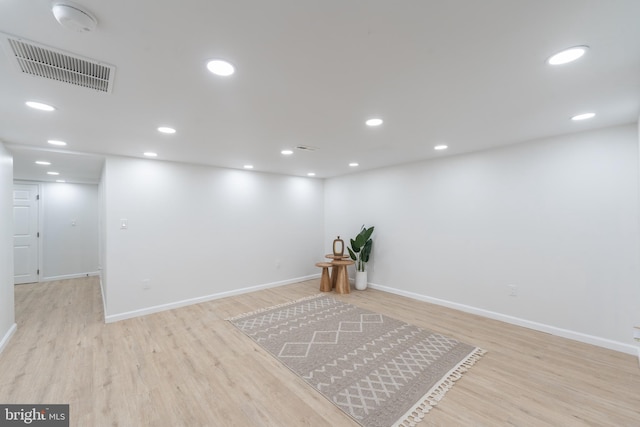 interior space featuring visible vents, recessed lighting, baseboards, and light wood-style floors