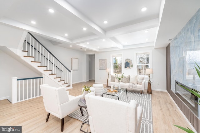 living room with stairway, recessed lighting, wood finished floors, and baseboards