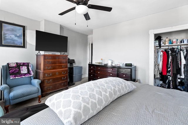 bedroom featuring a closet, carpet floors, and a ceiling fan