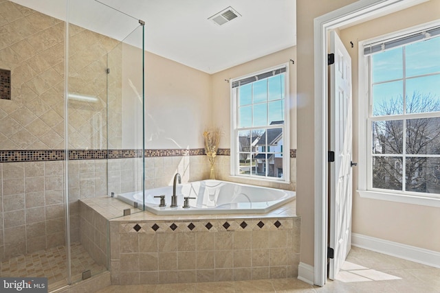 full bath with tile patterned floors, visible vents, a shower stall, baseboards, and a bath