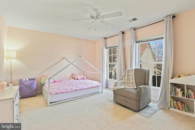 bedroom with visible vents, ceiling fan, baseboards, and carpet