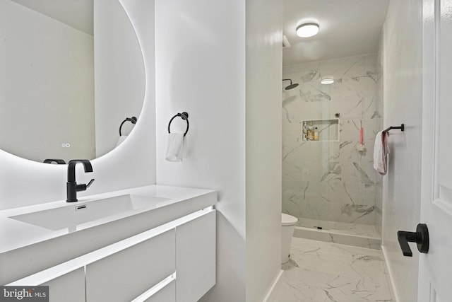 full bathroom featuring a marble finish shower, marble finish floor, toilet, and vanity