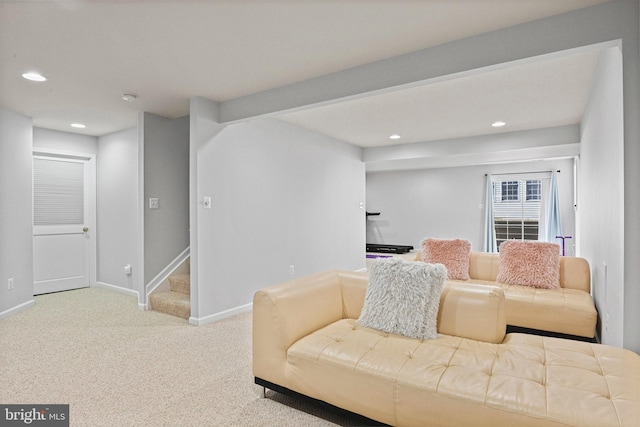 living area featuring recessed lighting, carpet flooring, baseboards, and stairs