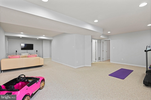 exercise room with recessed lighting, baseboards, and carpet floors