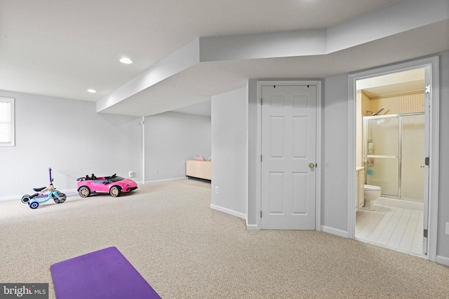 interior space featuring carpet flooring, recessed lighting, and baseboards