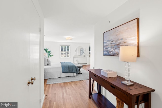 bedroom with light wood-style floors