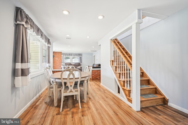 dining area featuring stairway, recessed lighting, and light wood-type flooring