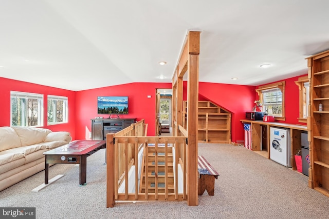 carpeted living area featuring recessed lighting and lofted ceiling