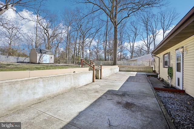 exterior space with concrete driveway