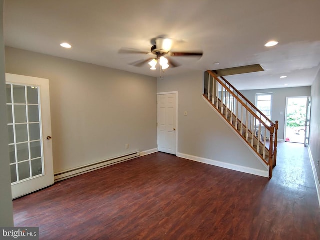 unfurnished room featuring stairway, baseboards, recessed lighting, dark wood-style flooring, and a baseboard heating unit