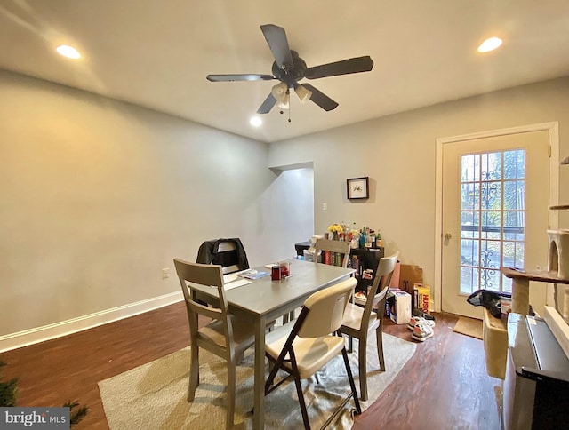 dining area with recessed lighting, a ceiling fan, baseboards, and wood finished floors