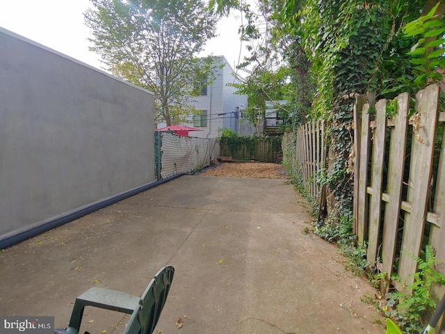 view of patio / terrace with fence