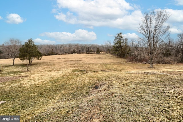 view of landscape with a rural view