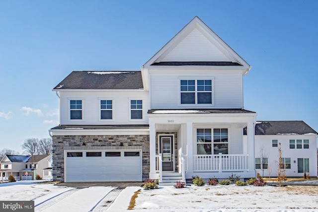 view of front of home with stone siding, covered porch, an attached garage, and a shingled roof