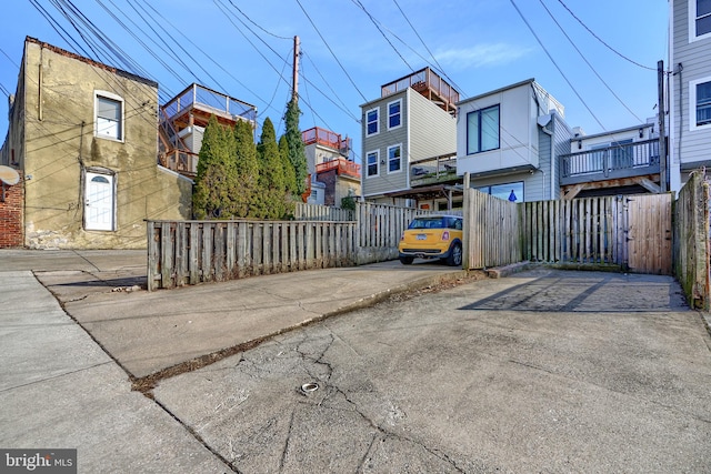 view of gate with fence