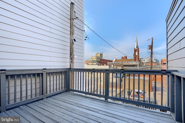 wooden terrace with a view of city