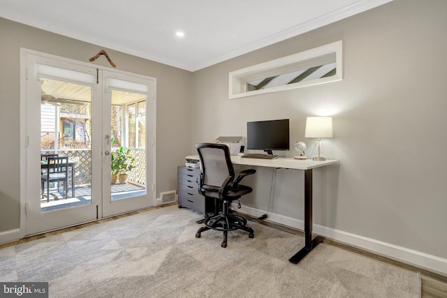 office space featuring visible vents, french doors, baseboards, and ornamental molding