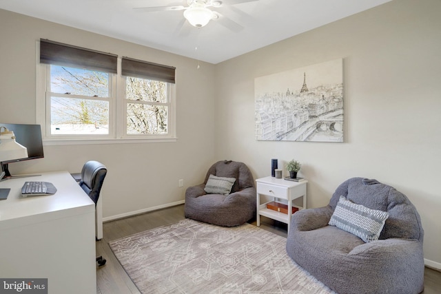 home office featuring wood finished floors, baseboards, and ceiling fan