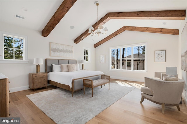 bedroom featuring wood finished floors, visible vents, baseboards, lofted ceiling with beams, and a notable chandelier