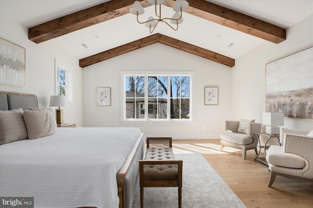 bedroom with visible vents, a notable chandelier, wood finished floors, and vaulted ceiling with beams