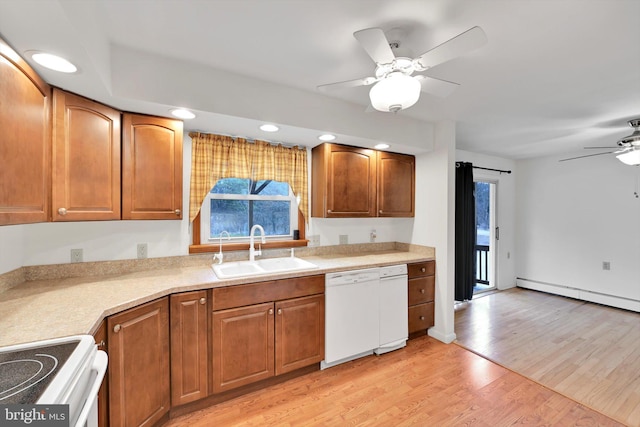 kitchen featuring range with electric cooktop, a ceiling fan, a sink, light wood-style floors, and white dishwasher