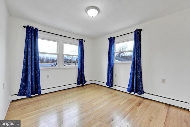 unfurnished room featuring wood finished floors