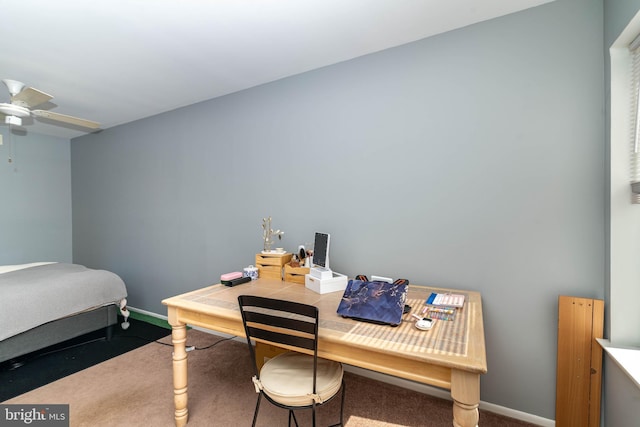 carpeted bedroom featuring baseboards