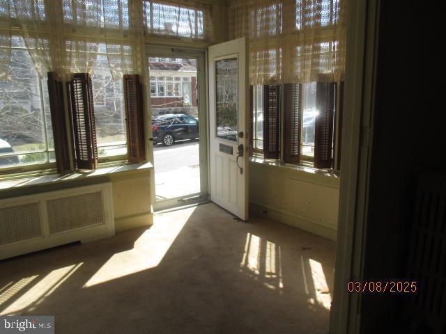 interior space featuring radiator heating unit