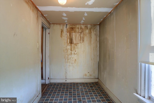 empty room with tile patterned floors