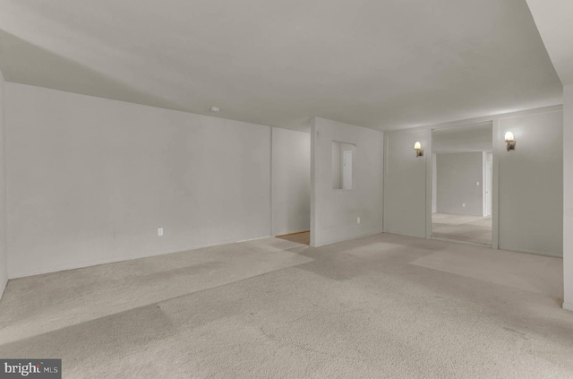 unfurnished room with carpet floors