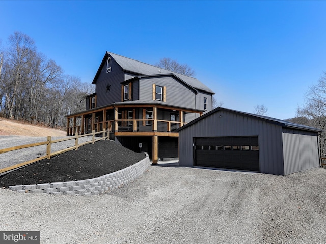 view of front of home with an outbuilding