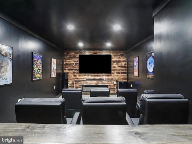 cinema with recessed lighting and a fireplace