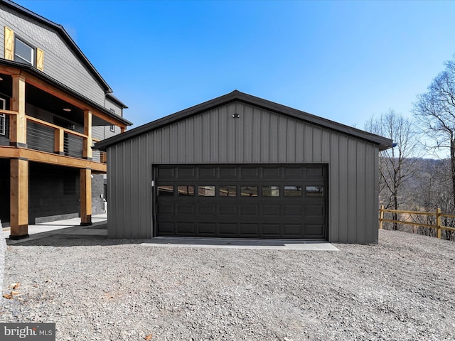 detached garage with fence