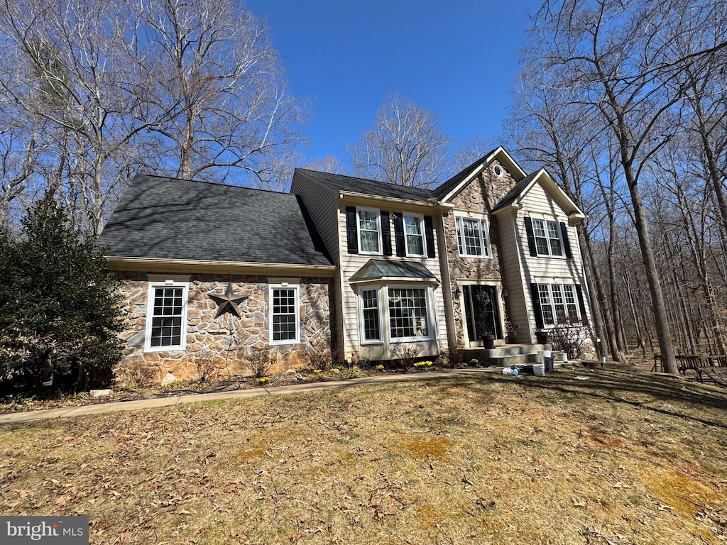 view of front of property with stone siding