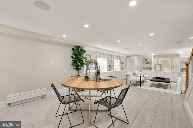 dining area with recessed lighting and baseboards