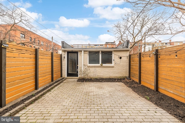 view of patio featuring a fenced backyard