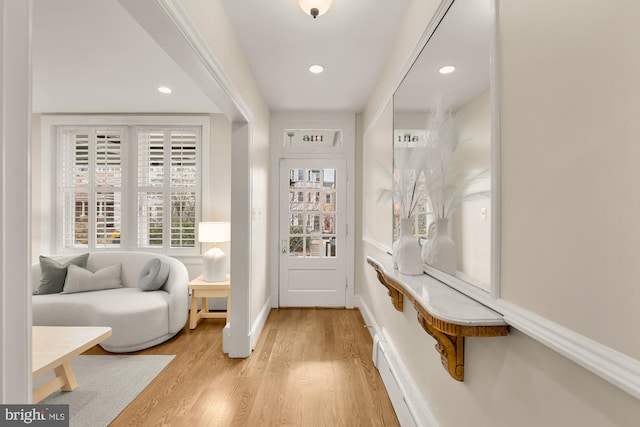 entrance foyer featuring recessed lighting, baseboards, and light wood finished floors