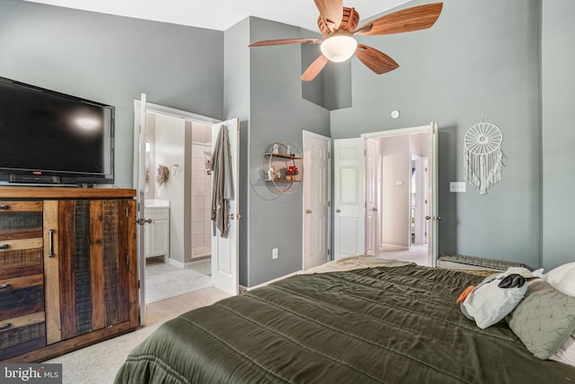 7721 Sullivan Cir, Alexandria, VA 22315 - bedroom with a ceiling fan, light carpet, baseboards, high vaulted ceiling, and ensuite bathroom