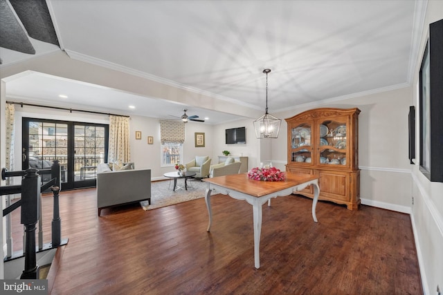 dining space with dark wood-style floors, baseboards, recessed lighting, ornamental molding, and ceiling fan with notable chandelier