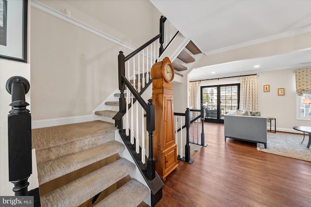 stairs with recessed lighting, baseboards, wood finished floors, and ornamental molding