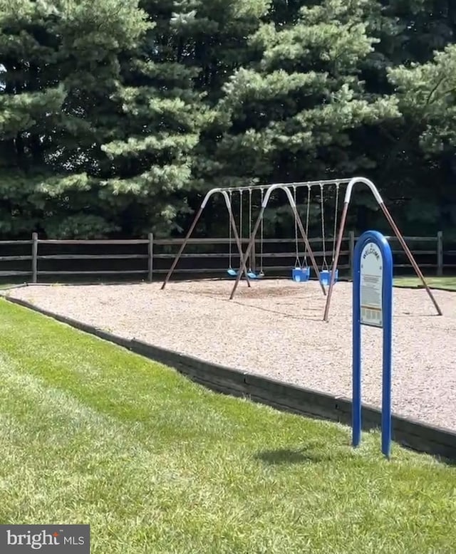 community play area featuring fence