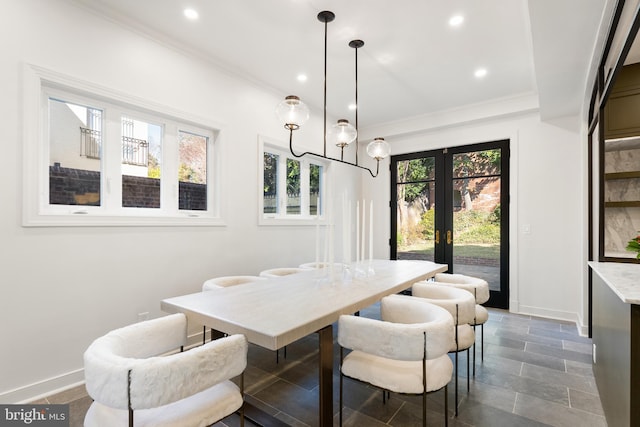 dining space with recessed lighting, baseboards, french doors, and ornamental molding