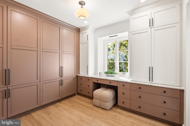 unfurnished office with visible vents, recessed lighting, and light wood-type flooring