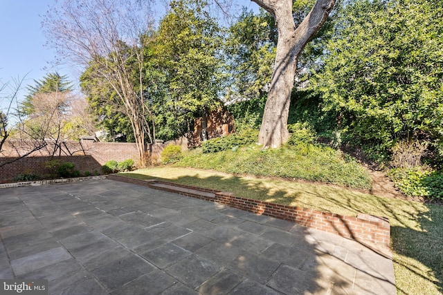 view of patio with fence